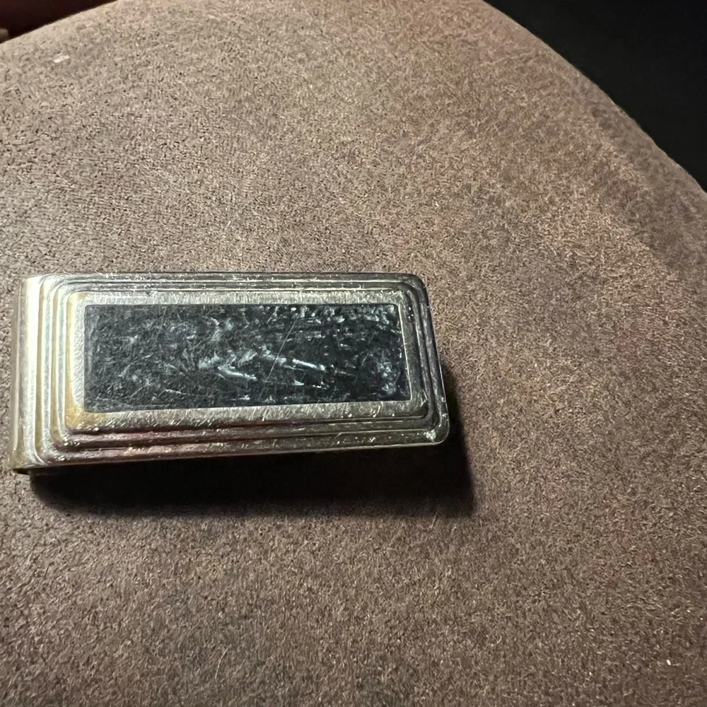 Adjustable money clip.